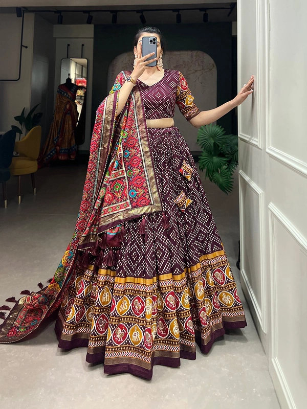 Antique Fashion 1 This beautifully printed lehengadesign going from a royal shade ensemble for function - wine