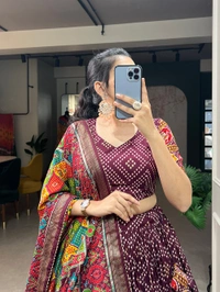 Antique Fashion 1 This beautifully printed lehengadesign going from a royal shade ensemble for function - wine
