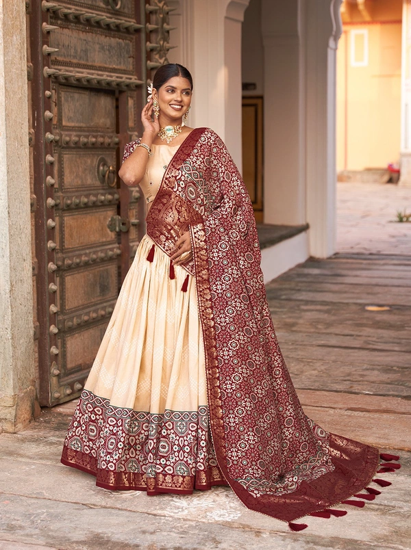 Antique Fashion  In the embrace of Tusser silk adorned with Ajarakh prints the lehenga choli becomes not just a garment but a reflection of tradition grace and beauty  - off white
