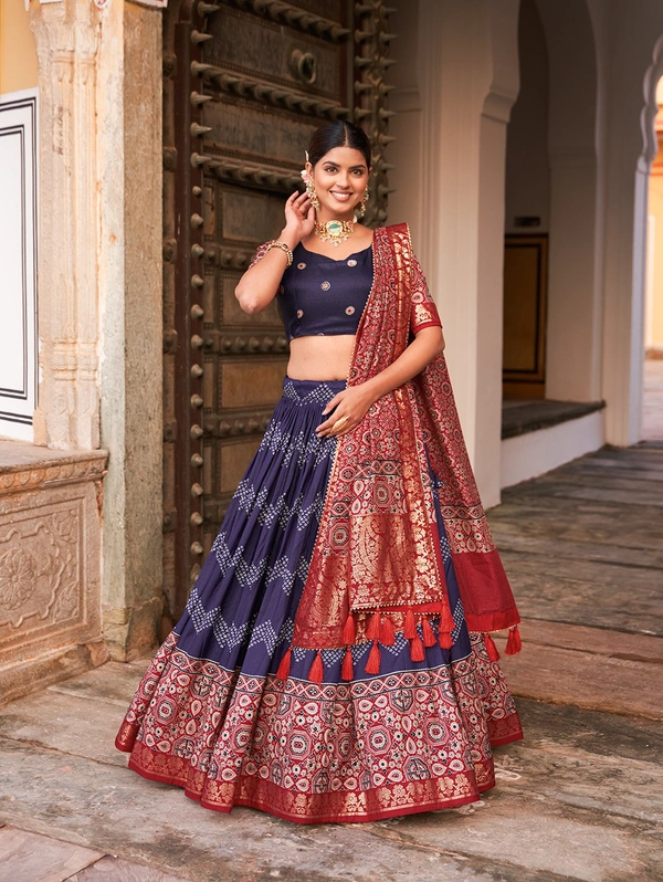 Antique Fashion  In the embrace of Tusser silk adorned with Ajarakh prints the lehenga choli becomes not just a garment but a reflection of tradition grace and beauty  - Navy Blue