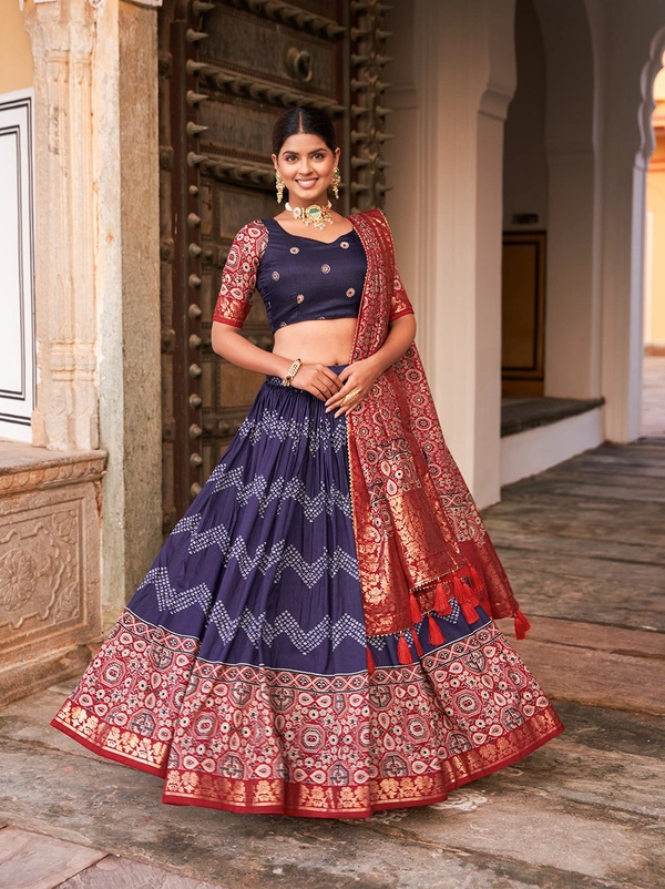 Antique Fashion  In the embrace of Tusser silk adorned with Ajarakh prints the lehenga choli becomes not just a garment but a reflection of tradition grace and beauty  - Navy Blue