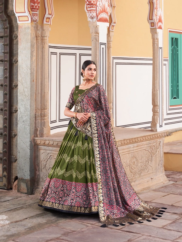 Antique Fashion  In the embrace of Tusser silk adorned with Ajarakh prints the lehenga choli becomes not just a garment but a reflection of tradition grace and beauty  - green