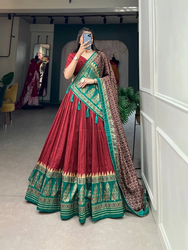 Antique Fashion  Adorn yourself in the timeless grace of Tussar silk  woven with intricate prints for an ethereal allure - red