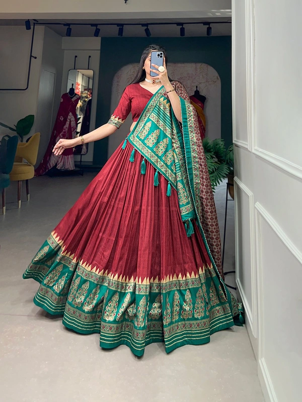 Antique Fashion  Adorn yourself in the timeless grace of Tussar silk  woven with intricate prints for an ethereal allure - red