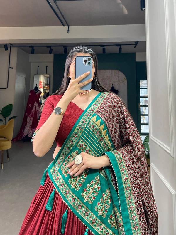 Antique Fashion  Adorn yourself in the timeless grace of Tussar silk  woven with intricate prints for an ethereal allure - red