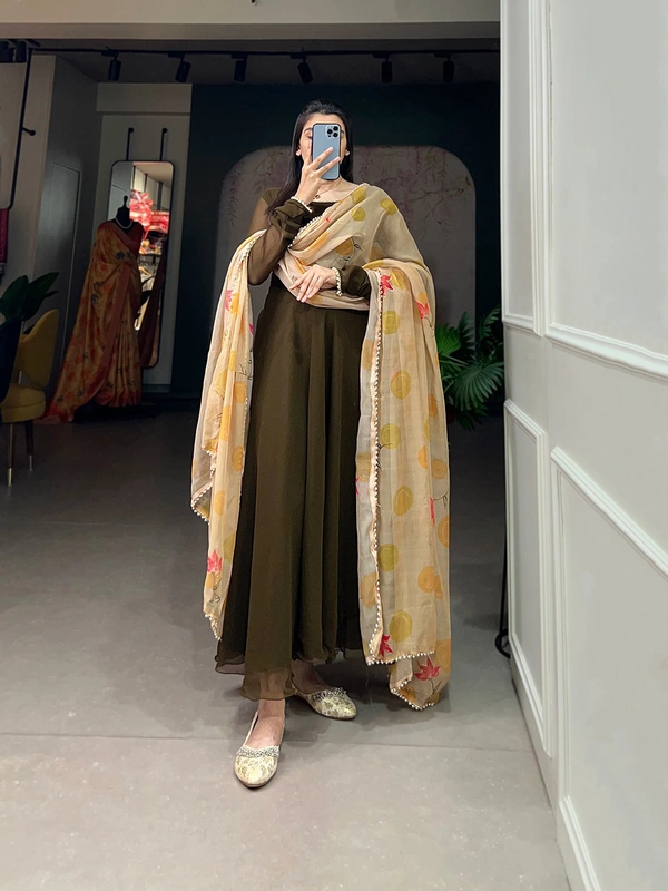 Antique Fashion 1 In the simplicity of a plain gown and the ethereal touch of an organza dupatta, elegance finds its perfect harmony. - mehendi