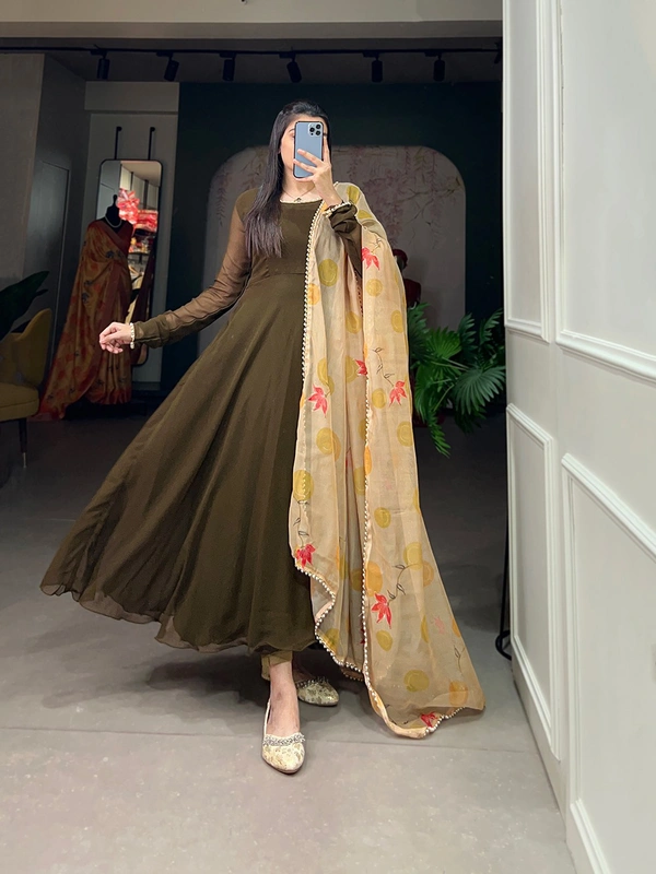 Antique Fashion 1 In the simplicity of a plain gown and the ethereal touch of an organza dupatta, elegance finds its perfect harmony. - mehendi