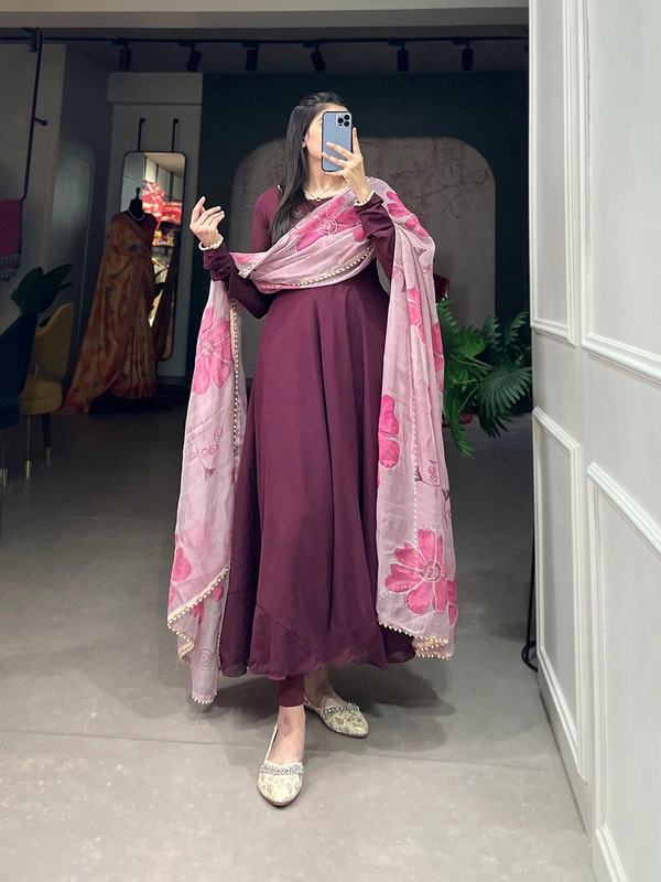 Antique Fashion 1 In the simplicity of a plain gown and the ethereal touch of an organza dupatta, elegance finds its perfect harmony. - wine