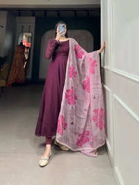 Antique Fashion 1 In the simplicity of a plain gown and the ethereal touch of an organza dupatta, elegance finds its perfect harmony. - wine