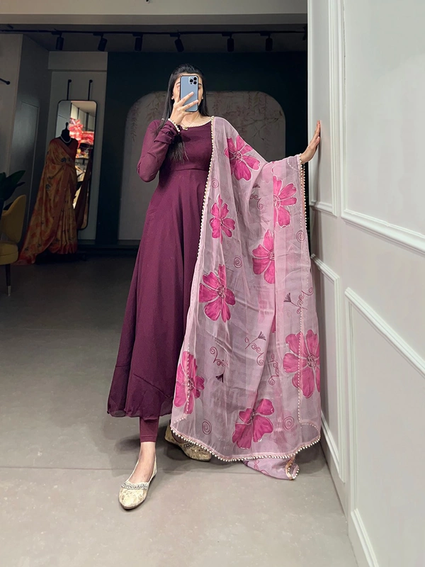 Antique Fashion 1 In the simplicity of a plain gown and the ethereal touch of an organza dupatta, elegance finds its perfect harmony. - wine