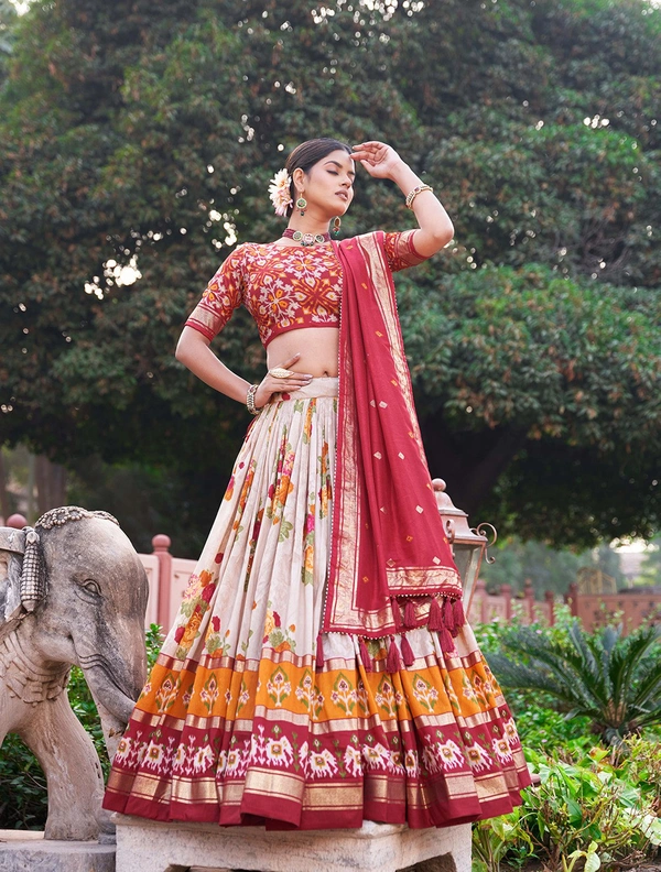Antique Fashion  Embrace elegance with every twirl Dive into the enchanting world of florals with our mesmerizing Dola silk lehenga choli - Red
