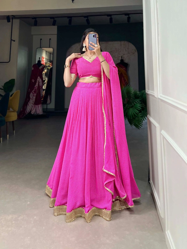 Antique Fashion  Channel Effortless Charm with our Dot Print Georgette Lehenga Choli - pink