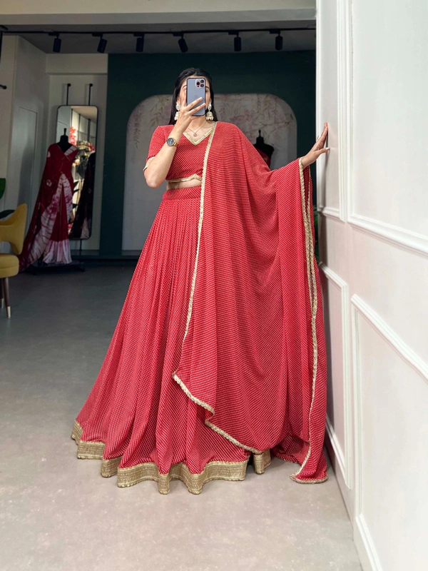 Antique Fashion  Channel Effortless Charm with our Dot Print Georgette Lehenga Choli - Red