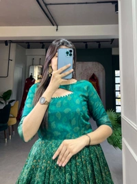Antique Fashion 1 Adorn yourself in the poetry of print  as the gown weaves dreams of beauty and tradition  - green