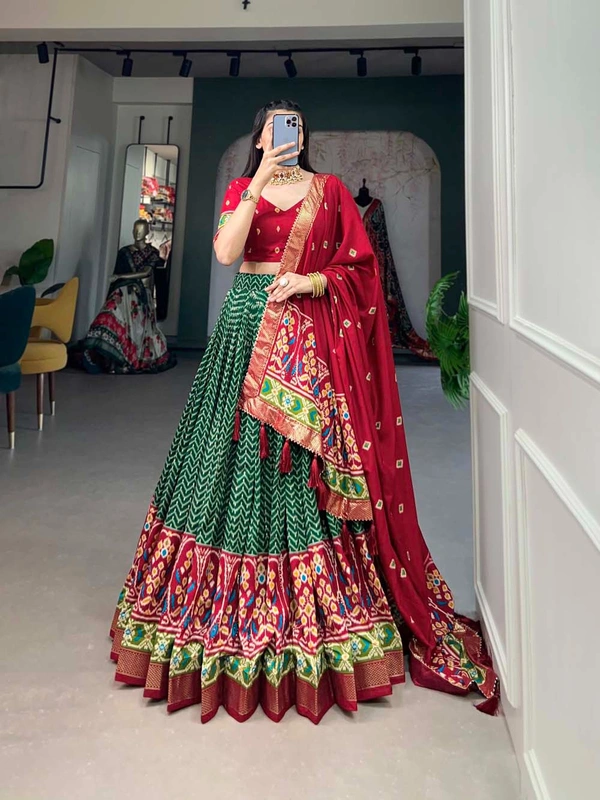Antique Fashion 1 Step into the spotlight with confidence in our Tussar silk printed lehenga choli crafted to perfection for every occasion - green