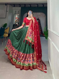 Antique Fashion 1 Step into the spotlight with confidence in our Tussar silk printed lehenga choli crafted to perfection for every occasion - green