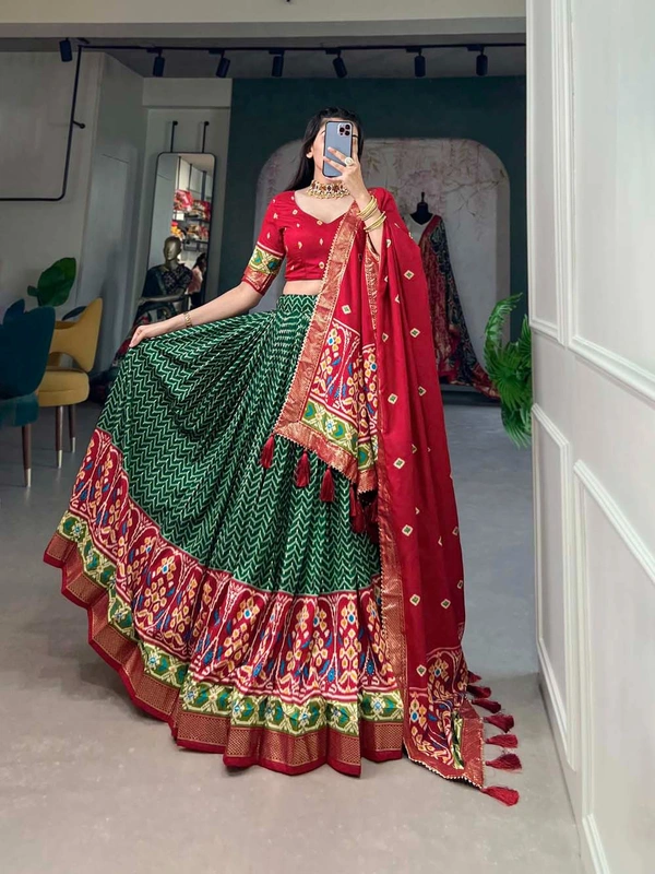 Antique Fashion 1 Step into the spotlight with confidence in our Tussar silk printed lehenga choli crafted to perfection for every occasion - green