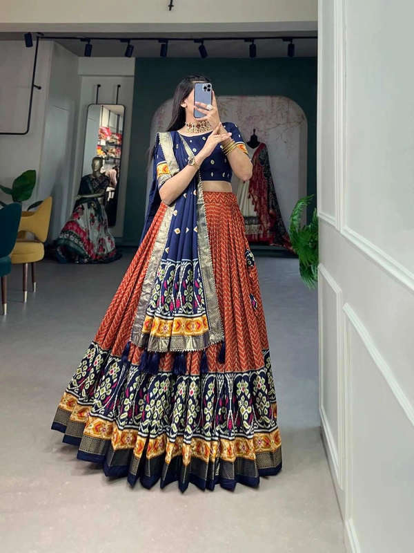 Antique Fashion 1 Step into the spotlight with confidence in our Tussar silk printed lehenga choli crafted to perfection for every occasion - orange