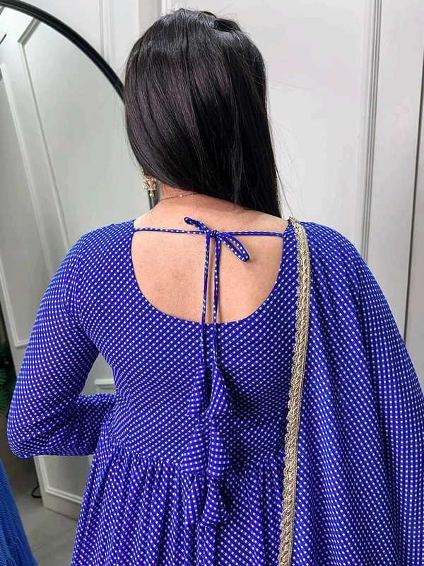 Antique Fashion 1 This Printed gown flutters like a butterfly each flutter a celebration of warmth and style  - blue