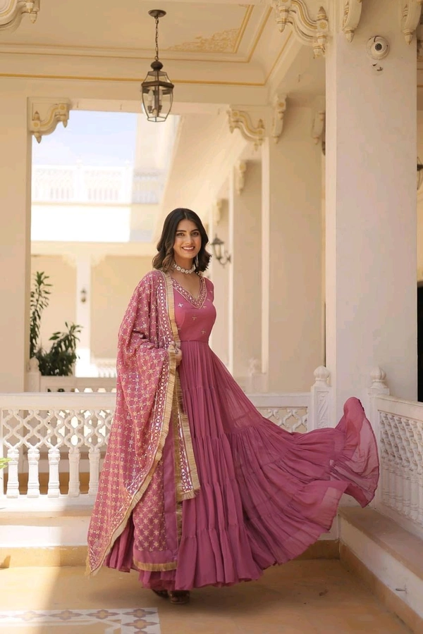 Antique Fashion  Discover the elegance of traditional attire with our Designer Festive Wear Gown featuring Attractive Sequins Embroidery Work - M (38), colour 1