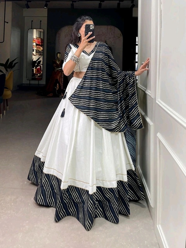 Antique Fashion 1 The only way to describe your navratri night classy is by wearing this white printed garba choli  - colour 1