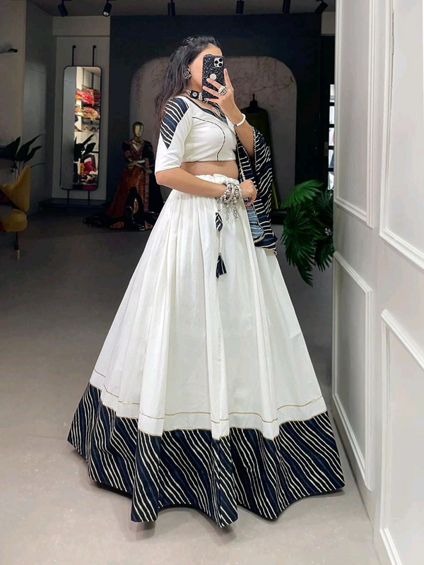 Antique Fashion 1 The only way to describe your navratri night classy is by wearing this white printed garba choli  - colour 1