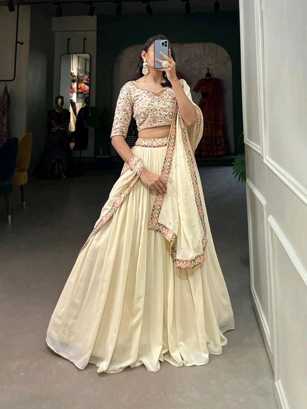 Capture Hearts in Off White  Exquisitely Embroidered Lehenga Choli with Shimmering Sequins  