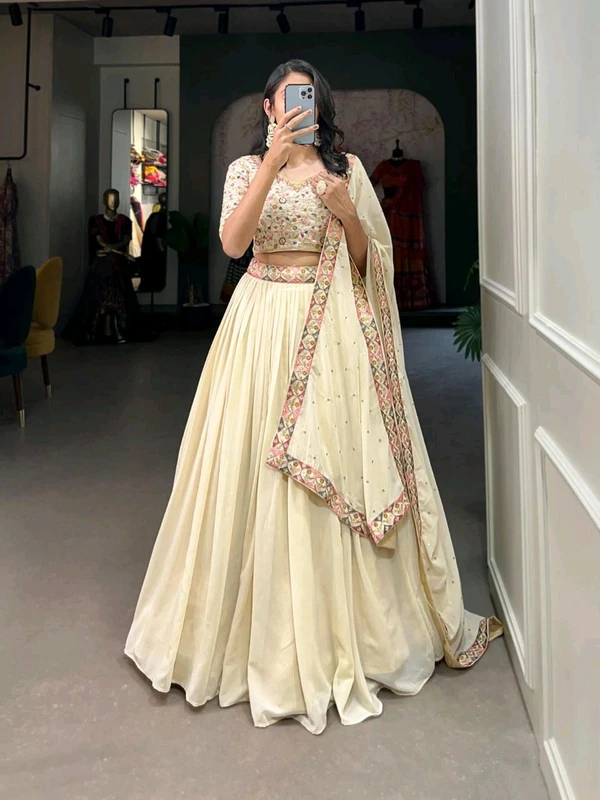 Antique Fashion  Capture Hearts in Off White  Exquisitely Embroidered Lehenga Choli with Shimmering Sequins  