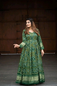 Antique Fashion 1 Presenting a perfectly blended endless array of patterns designs and  colors  that represents a vibrant indian culture   true essence of our traditional gaji silk bandhej gown  - colour 1