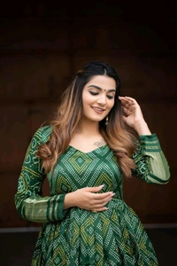 Antique Fashion 1 Presenting a perfectly blended endless array of patterns designs and  colors  that represents a vibrant indian culture   true essence of our traditional gaji silk bandhej gown  - colour 1