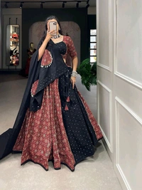 Antique Fashion 1 Presenting to you our latest masterpiece of Navratri collection. Dress up into this printed new maroon color and the mirror work chaniya choli  to a create your garba look more significant