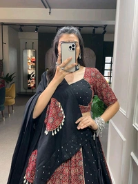 Antique Fashion 1 Presenting to you our latest masterpiece of Navratri collection. Dress up into this printed new maroon color and the mirror work chaniya choli  to a create your garba look more significant