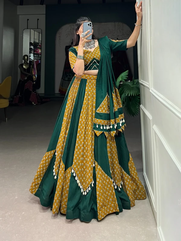 Step into the Festive Season with a Mustard  Green Cotton Chaniya Choli  Plain with Printed Kali and Beautiful Cowrie  Kodi  Work Embrace the Joy and Elegance of Mahendi 