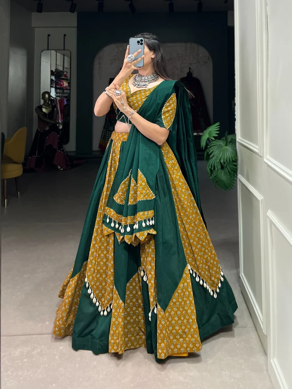 Antique Fashion Step into the Festive Season with a Mustard  Green Cotton Chaniya Choli  Plain with Printed Kali and Beautiful Cowrie  Kodi  Work Embrace the Joy and Elegance of Mahendi  - 