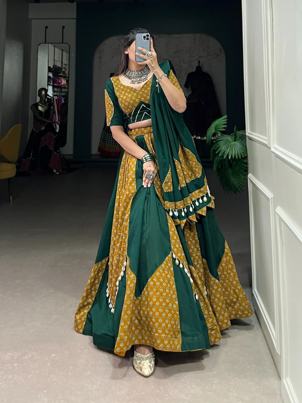 Antique Fashion Step into the Festive Season with a Mustard  Green Cotton Chaniya Choli  Plain with Printed Kali and Beautiful Cowrie  Kodi  Work Embrace the Joy and Elegance of Mahendi  - 