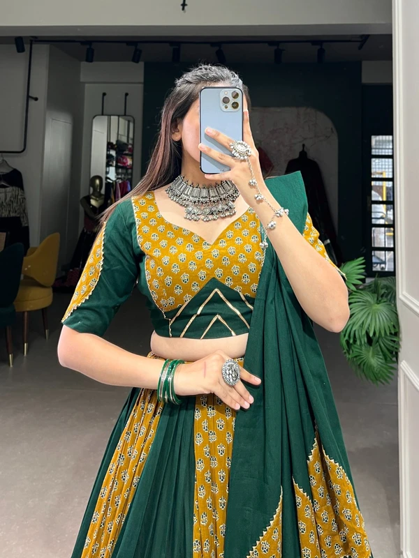 Antique Fashion Step into the Festive Season with a Mustard  Green Cotton Chaniya Choli  Plain with Printed Kali and Beautiful Cowrie  Kodi  Work Embrace the Joy and Elegance of Mahendi  - 