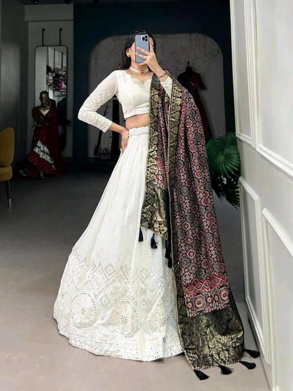 Antique Fashion 1 Experience timeless elegance with this beautiful lucknowi paper mirror work lehenga  - Designe 2