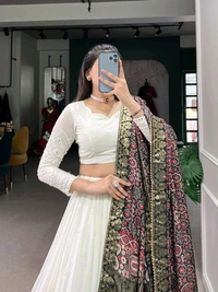 Antique Fashion 1 Experience timeless elegance with this beautiful lucknowi paper mirror work lehenga  - Designe 2
