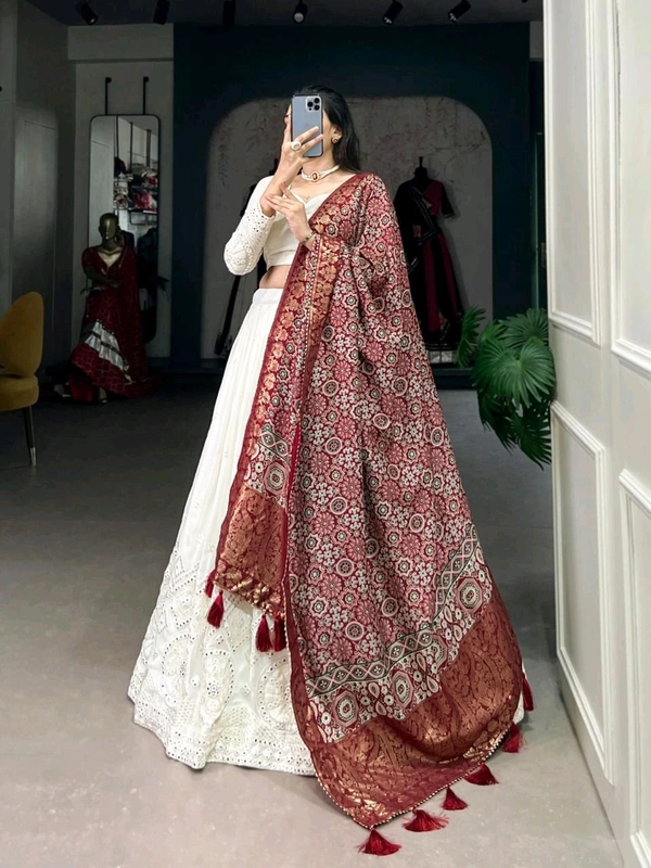 Antique Fashion 1 Experience timeless elegance with this beautiful lucknowi paper mirror work lehenga  - Designe 4