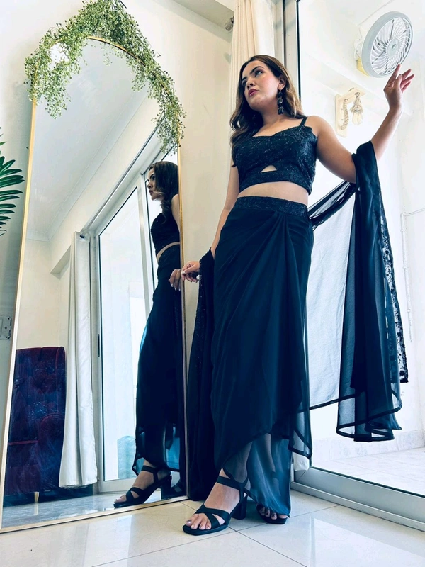 Antique Fashion 1 This wedding season flaunt this Irresistible party wear get ready to slay the cocktail look 3 pcs sharong dress is back in black  embellished with beautiful pure hand work in bustier and cape boders - S