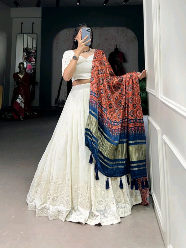 Antique Fashion 1 Experience timeless elegance with this beautiful lucknowi paper mirror work lehenga  - Designe 1