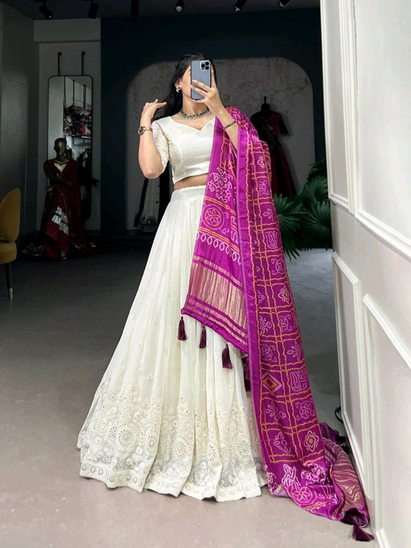 Antique Fashion 1 Experience timeless elegance with this beautiful lucknowi paper mirror work lehenga  - Designe 5