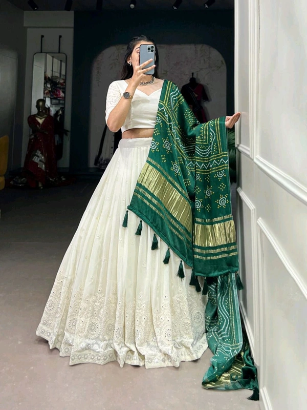 Antique Fashion 1 Experience timeless elegance with this beautiful lucknowi paper mirror work lehenga  - Designe 8