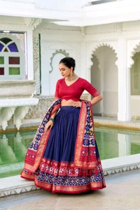 Antique Fashion 1 Presenting a perfectly blended Tussar Silk lehenga for festive season to charm your look  - Navy Blue, Unstitched Blouse