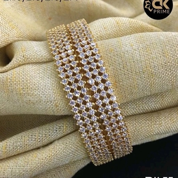 Gold Plated Bangles Made With Cz Stones And Green Colour Beads And Ruby