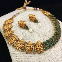 Gold Plated Matte Finish Laxmi Devi Necklace With Red Beads and Pearls Many Designs Available And COD Available