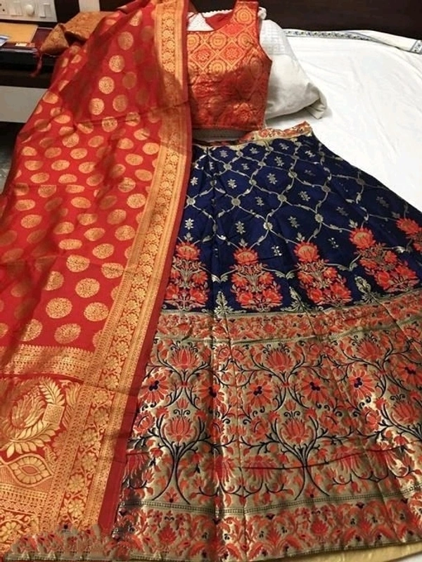 100% pure silk banarasi lehenga choli,Semi stitched lehenga, Design printed with zari on lehenga, blouse, duppatta Fully stitched blouse Duppatta with contrast borderLehenga waiste size:36 , length :42, Duppatta length :2.5m COD Available