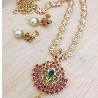 Trendy pearls work temple jewellery set, Cubic zirconia stones used in the LocketAlong with beautiful earrings pearls in hanging