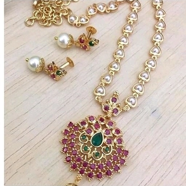 Trendy pearls work temple jewellery set, Cubic zirconia stones used in the LocketAlong with beautiful earrings pearls in hanging