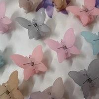 MINI CLEAR BUTTERFLY CLAWS - Sundown